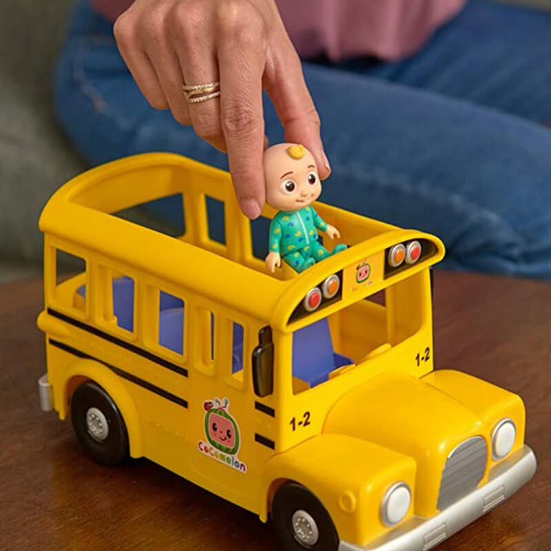 includes JJ Figure Cocomelon Musical Yellow School Bus Plays Wheels on The Bus 