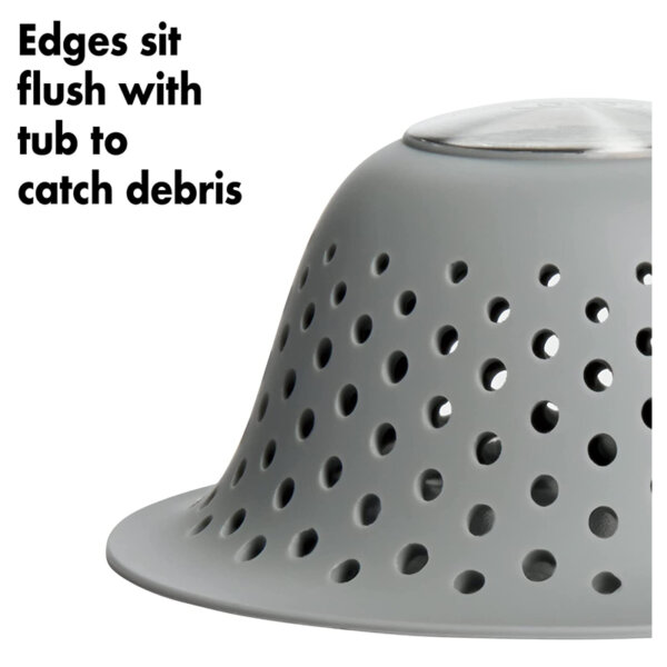 OXO Good Grips Silicone Drain Protector for Pop-Up & Regular Drains edges sit flush with tub to catch debris