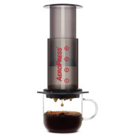 AeroPress Coffee and Espresso Maker – Quickly Makes Delicious Coffee Without Bitterness – 1 to 3 Cups Per Pressing, Black Gray, Height: 11.5″ (80R11)